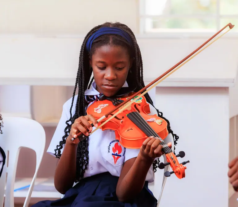 Learner practising the violin