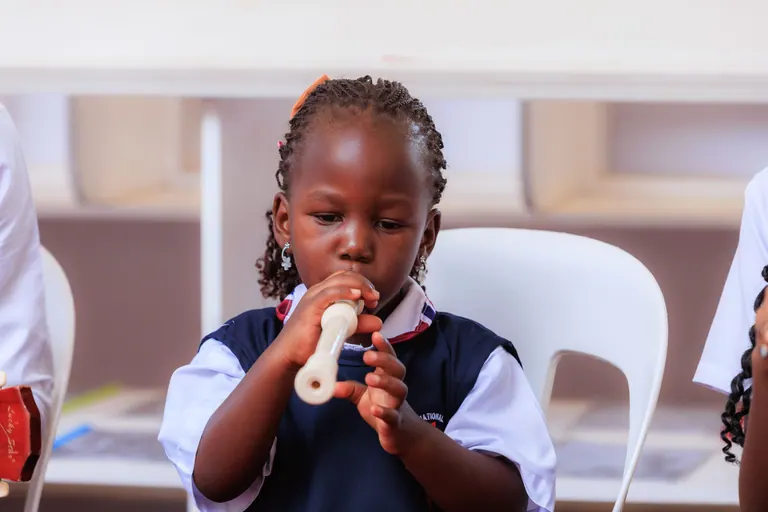 A learner practising the recorder