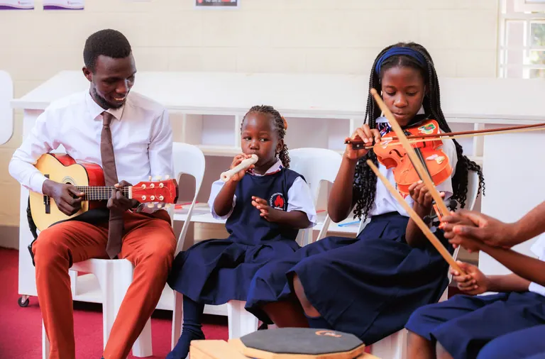 Learners enjoying music together