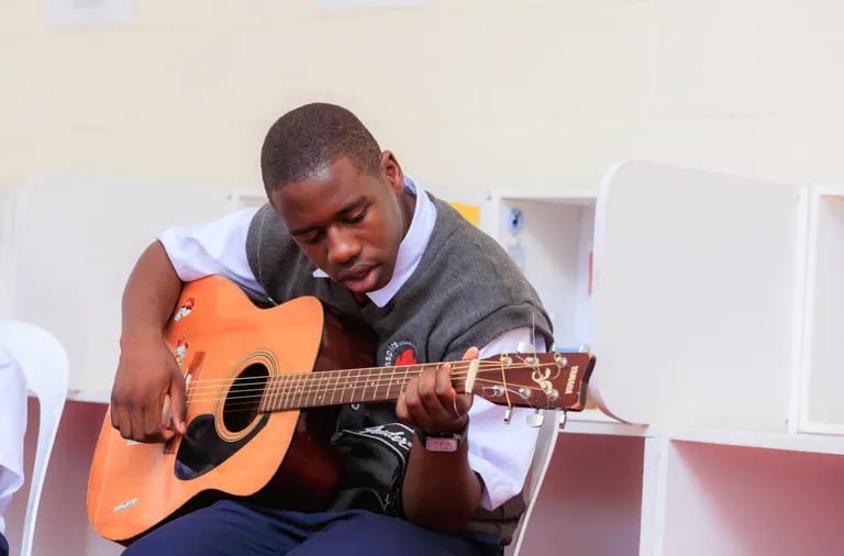 A musician playing the guitar