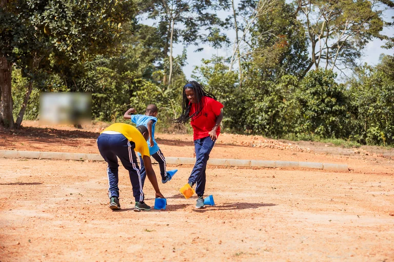 Learners practising football